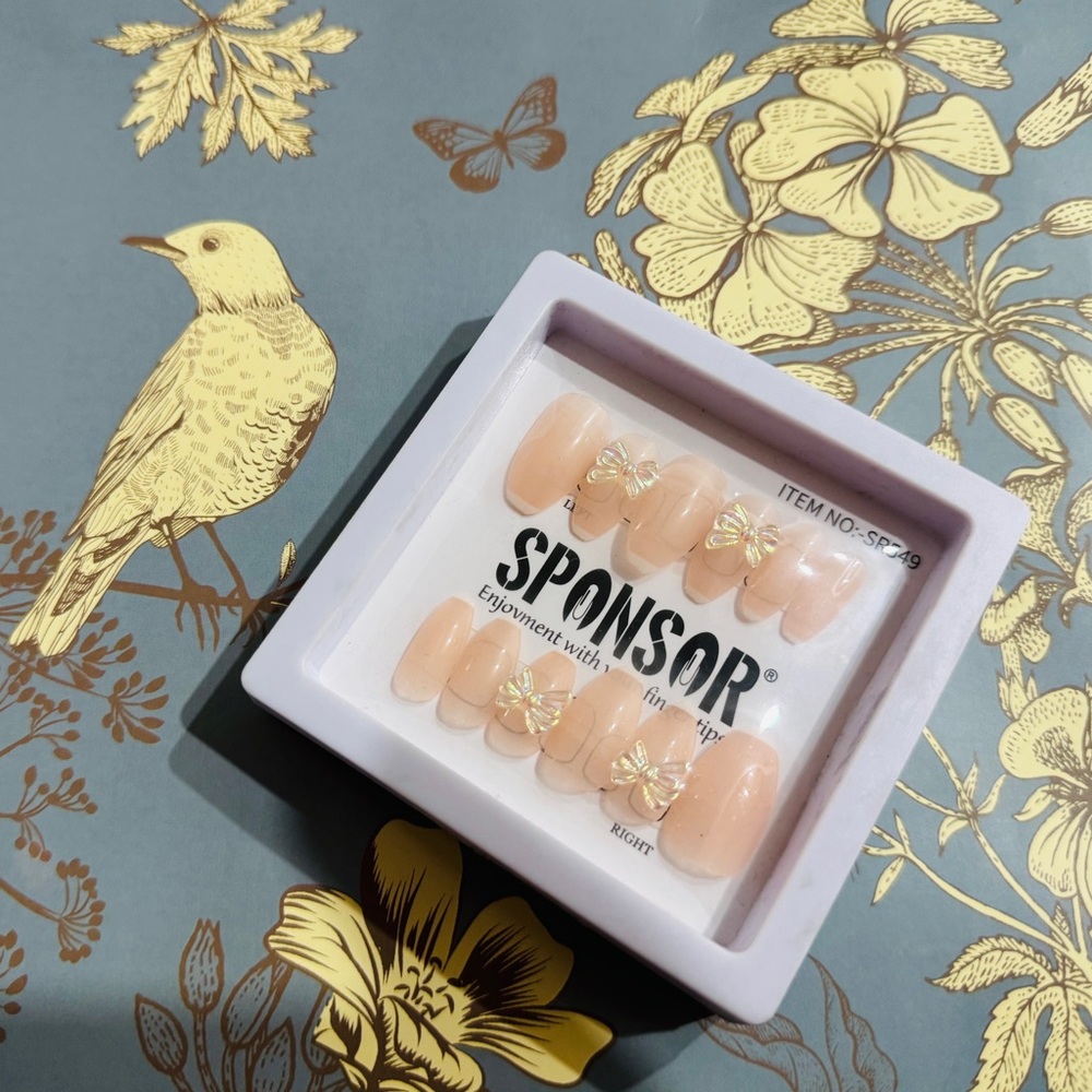 Peach Press-On Nails with Gold Butterfly Accents
